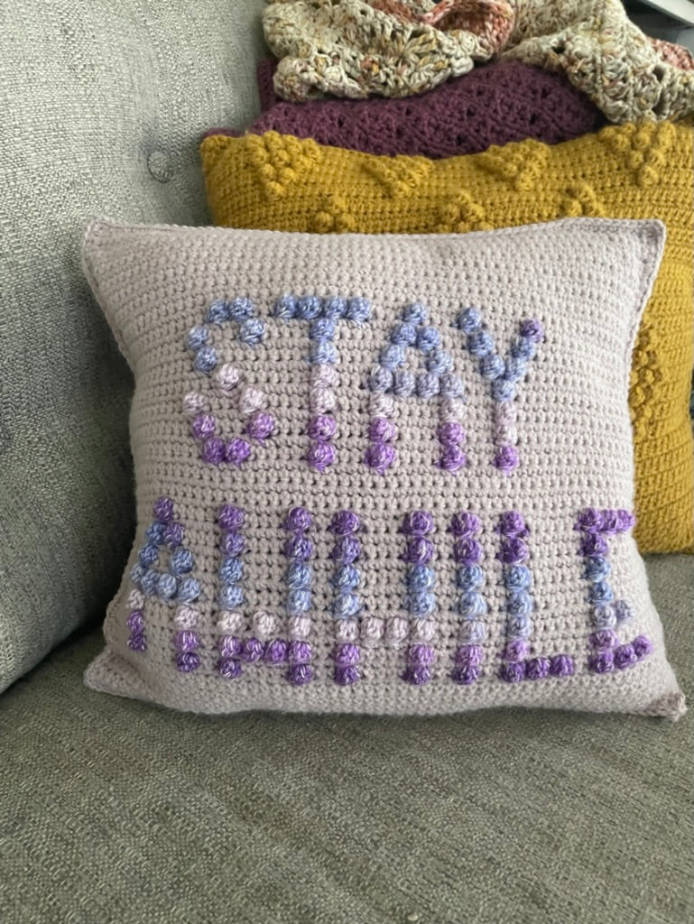Please Leave By 9/ Stay Awhile Reversible Crochet Pillow
